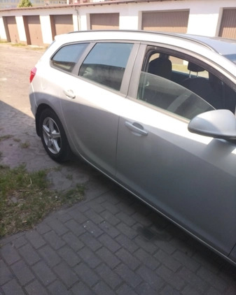 Opel Astra cena 16500 przebieg: 325000, rok produkcji 2012 z Sianów małe 56